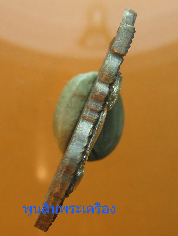 เหรียญเสมาราชาโชค หลวงพ่อคูณ วัดบ้านไร่ ออกวัดบ้านคลอง ชลบุรี เนื้อนวะหน้ากากเงิน เบอร์84 ปี2557 