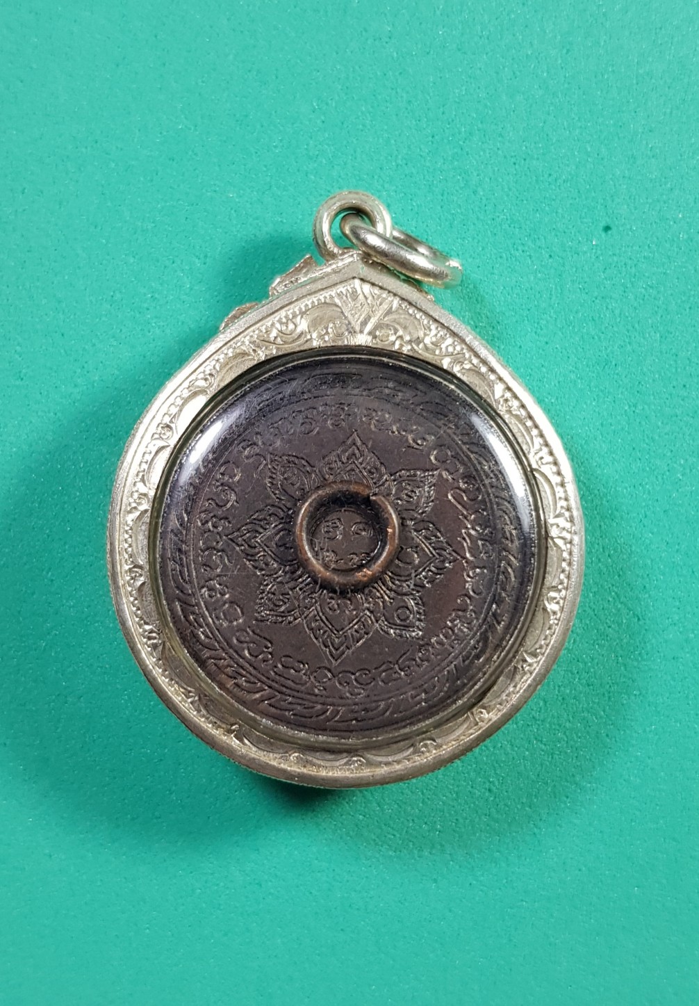 เหรียญกลมรุ่นแรก หลวงปู่คำปัน สุภัทโท วัดสันโป่ง